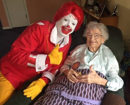 Photo courtesy of Twilight Wish Foundation / “Angela Brindley was 96 and in hospice care, living with her daughter and her husband,” said Mary E. Farrell, director of community relations at the Twilight Wish Foundation. “She was going through chemo and could barely stomach any food. The one thing she loved to eat were McDonald’s Egg McMuffins. We arranged for Ronald McDonald to visit her in person along with a special delivery of breakfast from a local family-owned McDonald’s.”