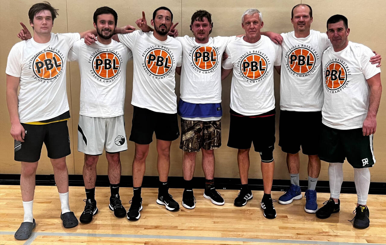 Submitted photo
Team members from 7 Cedars Casino celebrate a Peninsula Basketball League championship on Dec. 14. The team rolled to an 85-47 win over Black Diamond Electric.