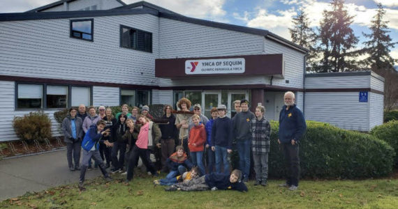 Submitted photo / Members of Sequim’s BSA Troop 1498 and Troop 7498 gather for a community service project at the Sequim YMCA earlier this month.
