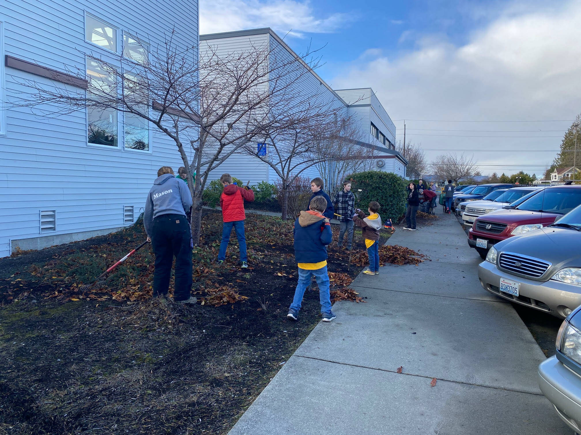 Submitted photo / Members of Sequim’s BSA Troop 1498 and Troop 7498 gather for a community service project at the Sequim YMCA earlier this month.