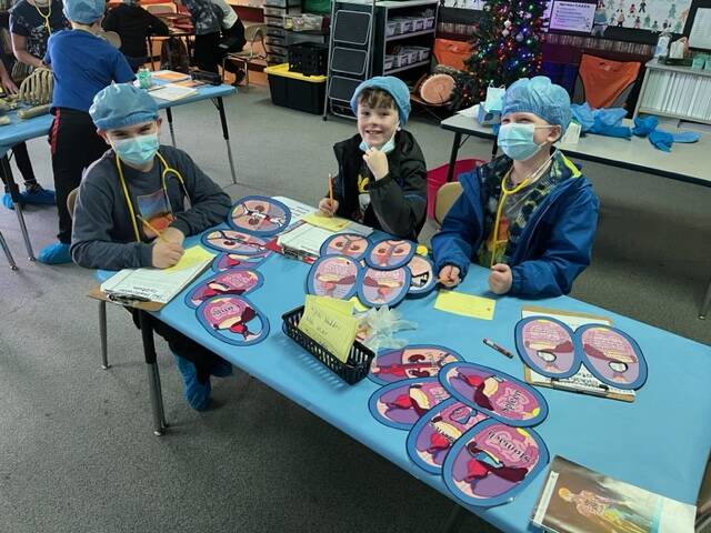 Submitted photos 
Greywolf Elementary students Winter Radcliff, Donavan Dahlquist and Mason Henderson take part in the in the Human Body Unit, joining classmates from Taleah Burr’s and Caryn Little’s third-grade classes.