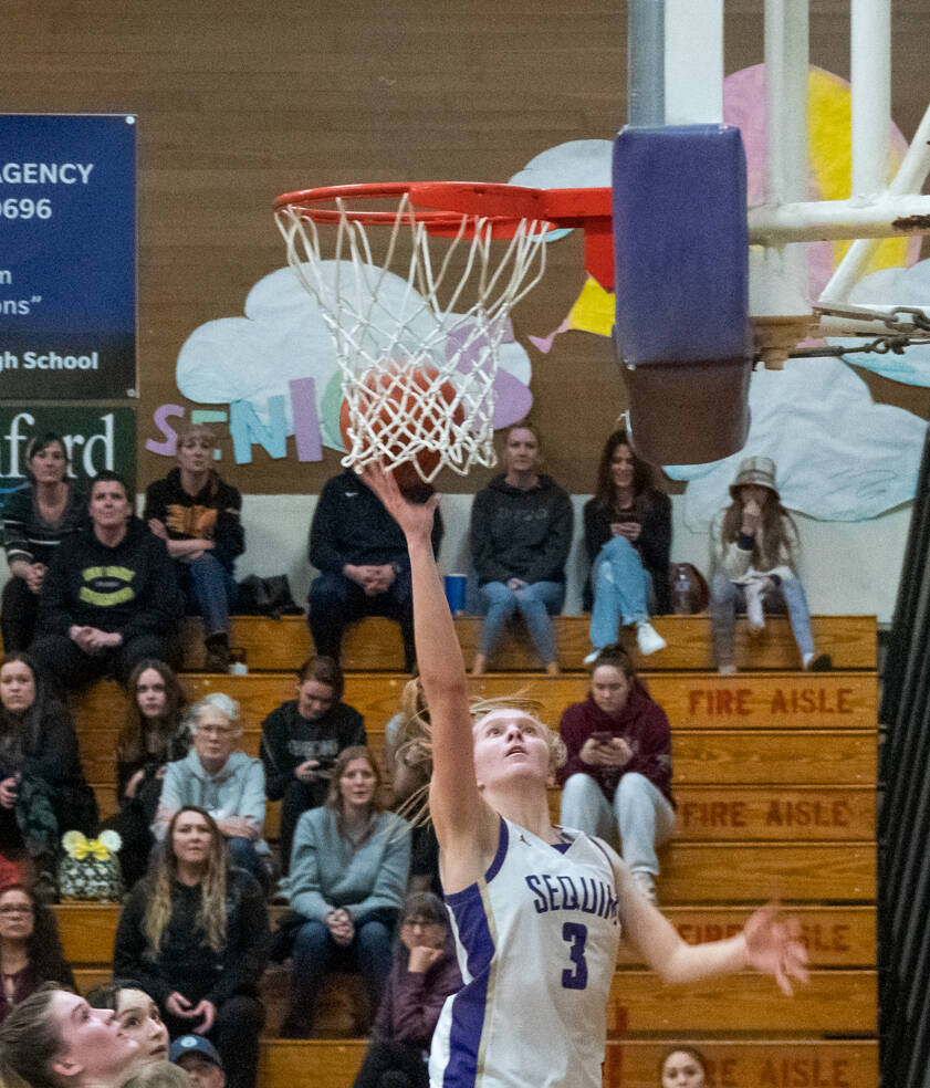 Sequim Gazette photo by Emily Matthiessen
Sequim’s Jolene Vaara goes to the basket for two of her team-high 20 points in a 64-49 Olympic League win over North Kitsap on Jan. 19.