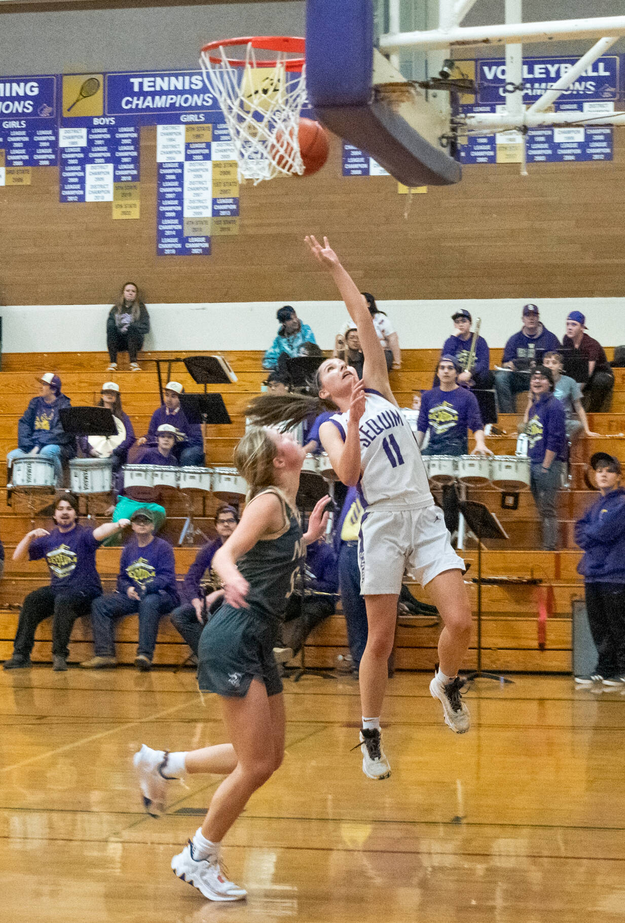 Sequim Gazette photo by Emily Matthiessen / Sequim’s Taryn Johnson, right, looks to score in the Wolves’ 64-49 home win over North Kitsap on Jan. 19.