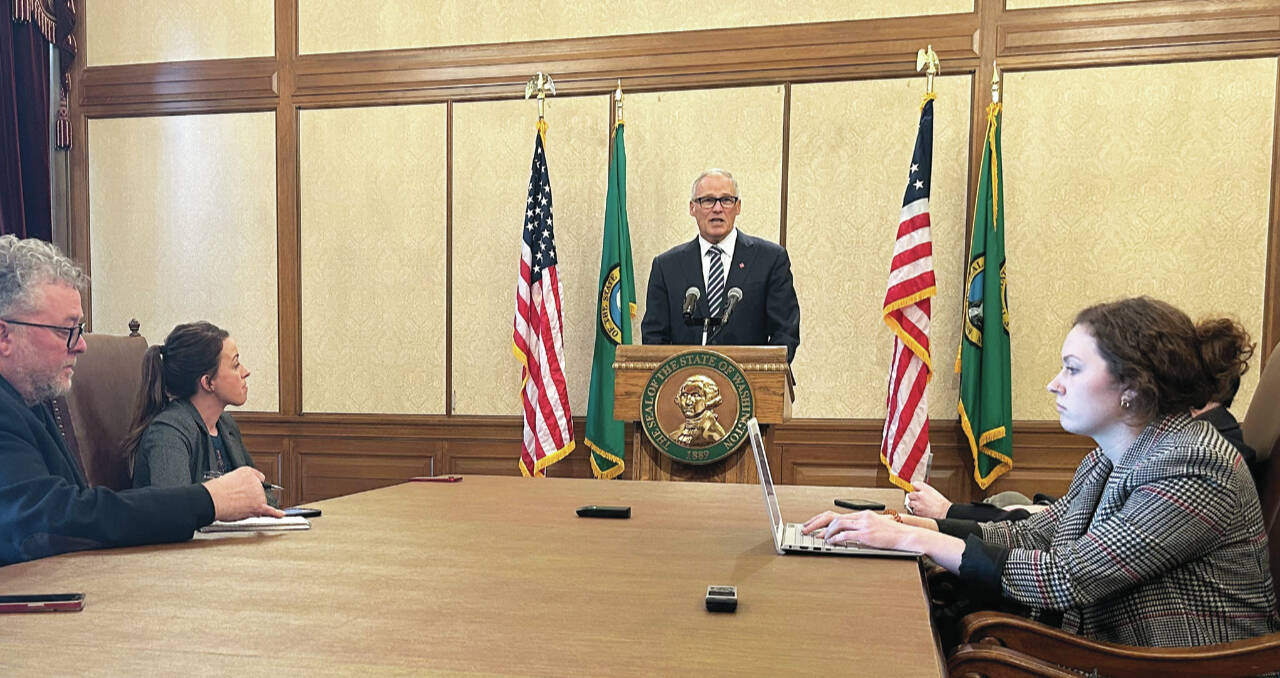 Photo by Alexandria Osborne/WNPA News Service / Gov. Jay Inslee tells reporters he will push for a bigger investment in programs for the homeless in this session of the Legislature.