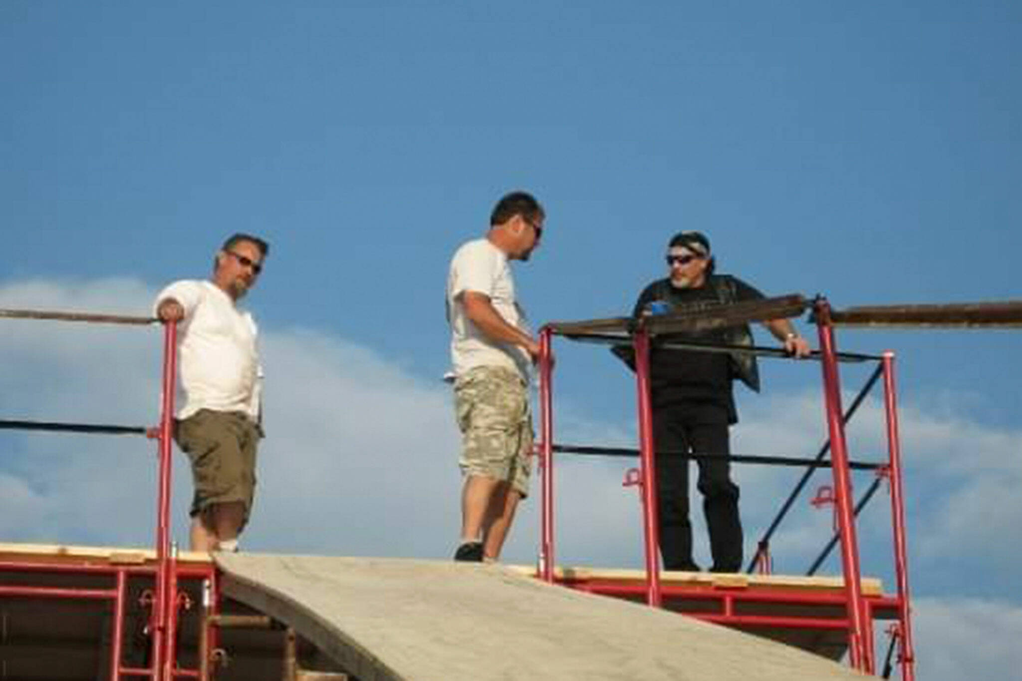 Photo courtesy of Todd Tjernell/ Robbie Knievel, right, speaks with crew members, including Todd Tjernell about logistics for his June 2007 jump at Frawley Stadium in Wilmington, Del.