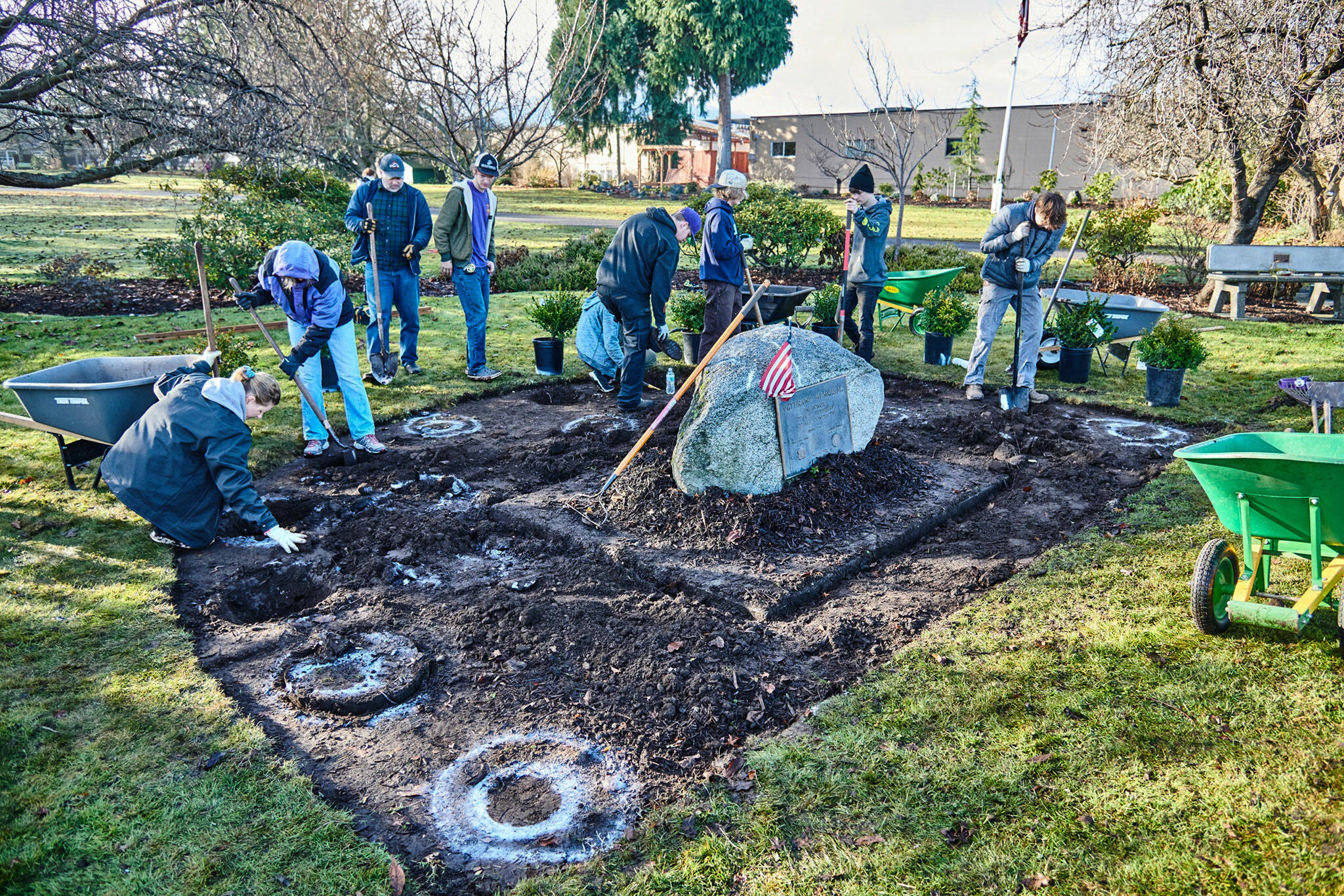 Photo courtesy Dan Mannisto/ BSA Scouts with Troop 90 and family and friends, led by Eagle Scout candidate Dean Rynearson, fourth from left, redid the Veterans Memorial Garden by the waterfall in Pioneer Memorial Park for Rynearson’s Eagle badge project.