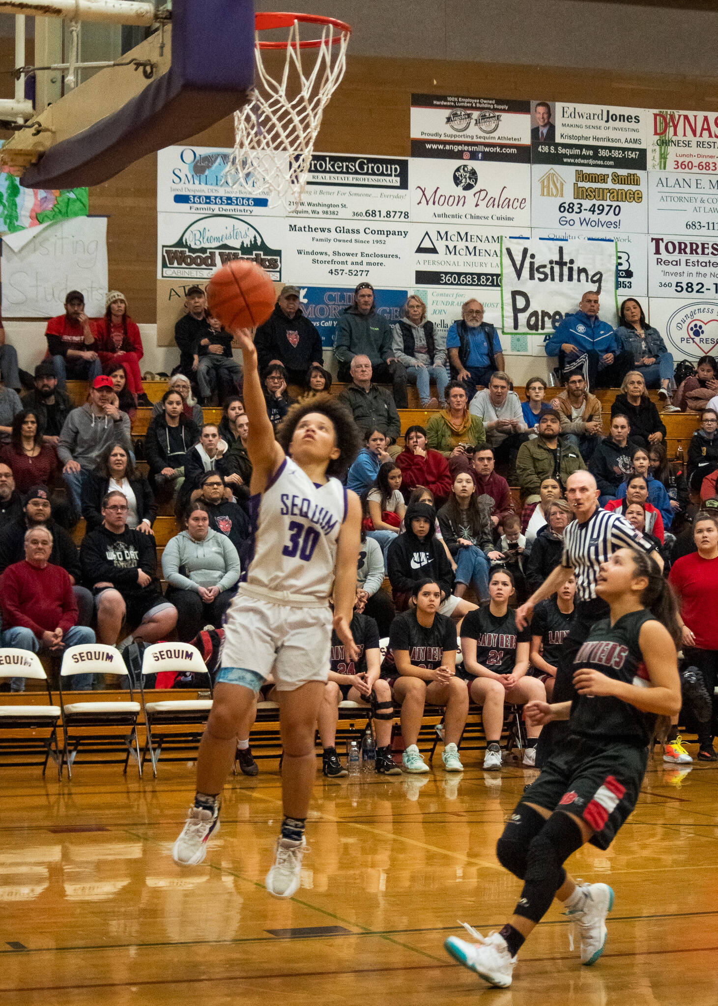 Sequim’s Bobbi Mixon drives to the basket for a score in a non-league match-up with Neah Bay on Feb. 7.