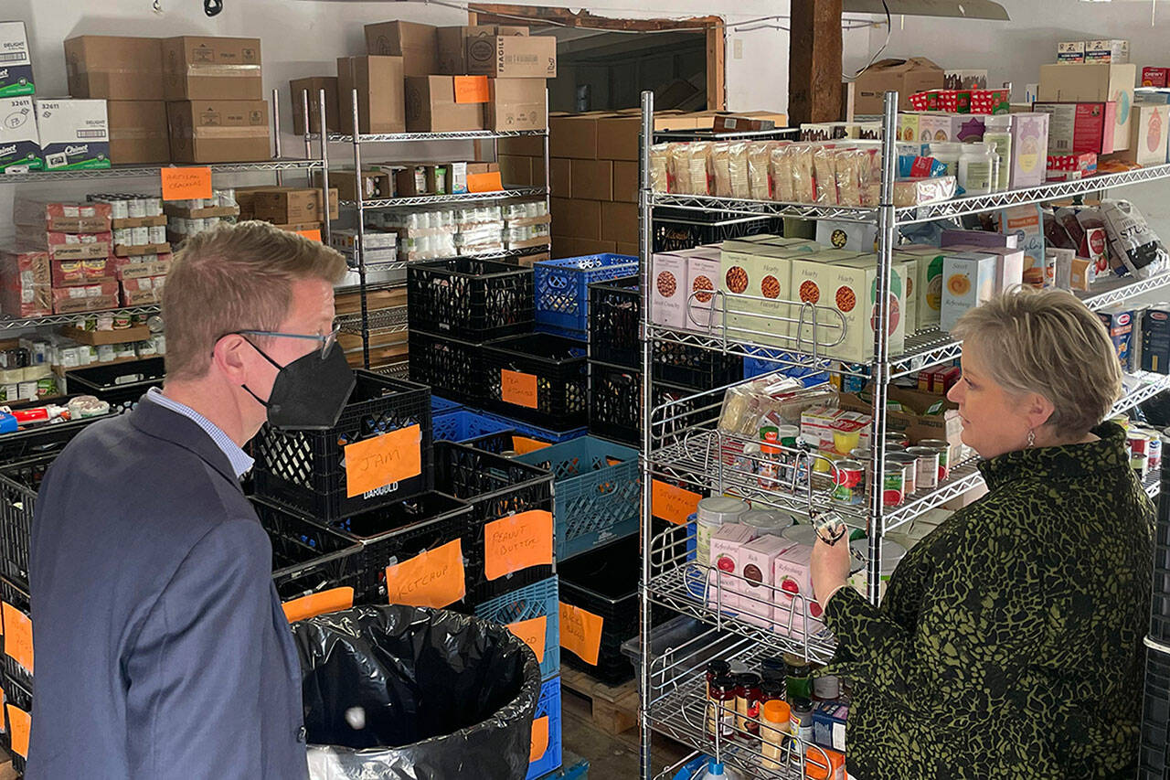 Sequim Gazette photo by Matthew Nash/ U.S. Rep, Derek Kilmer tours a portion of the Sequim Food Bank with its executive director Andra Smith on Feb. 10. He helped the facility receive American Rescue Plan Act dollars during the Covid-19 pandemic to help add storage and equipment.