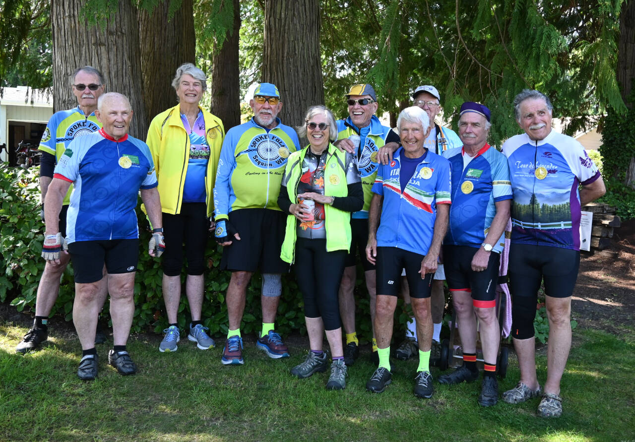 Sequim Gazette photo by Michael Dashiell / Eighty-year-olds with the Spokes Folk bicycling group enjoy a post-ride get-together on Aug. 12.