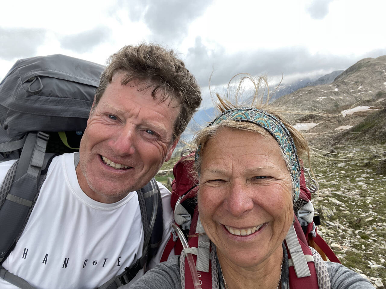 Photo by Carol Bernthal/Adam Henley / Adam Henley and Carol Bernthal stop for a photo op in the alpine country surrounding Pic du Midi Ossau, about 9,462 feet above sea level.