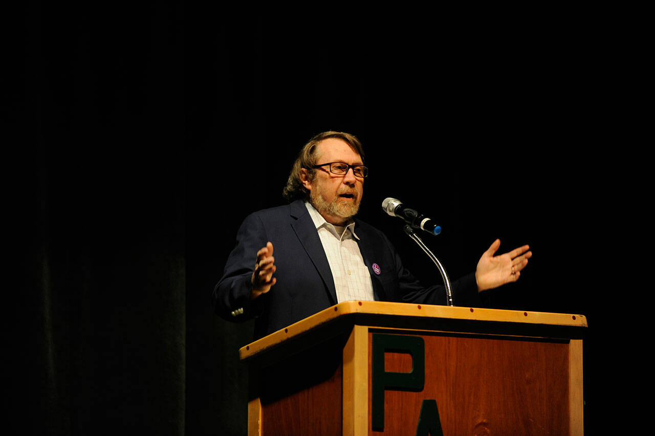 Sequim Gazette file photo by Michael Dashiell / Author Daniel James Brown tlaks about the writing of “The Boys in the Boat” at Port Angeles High School in 2016.
