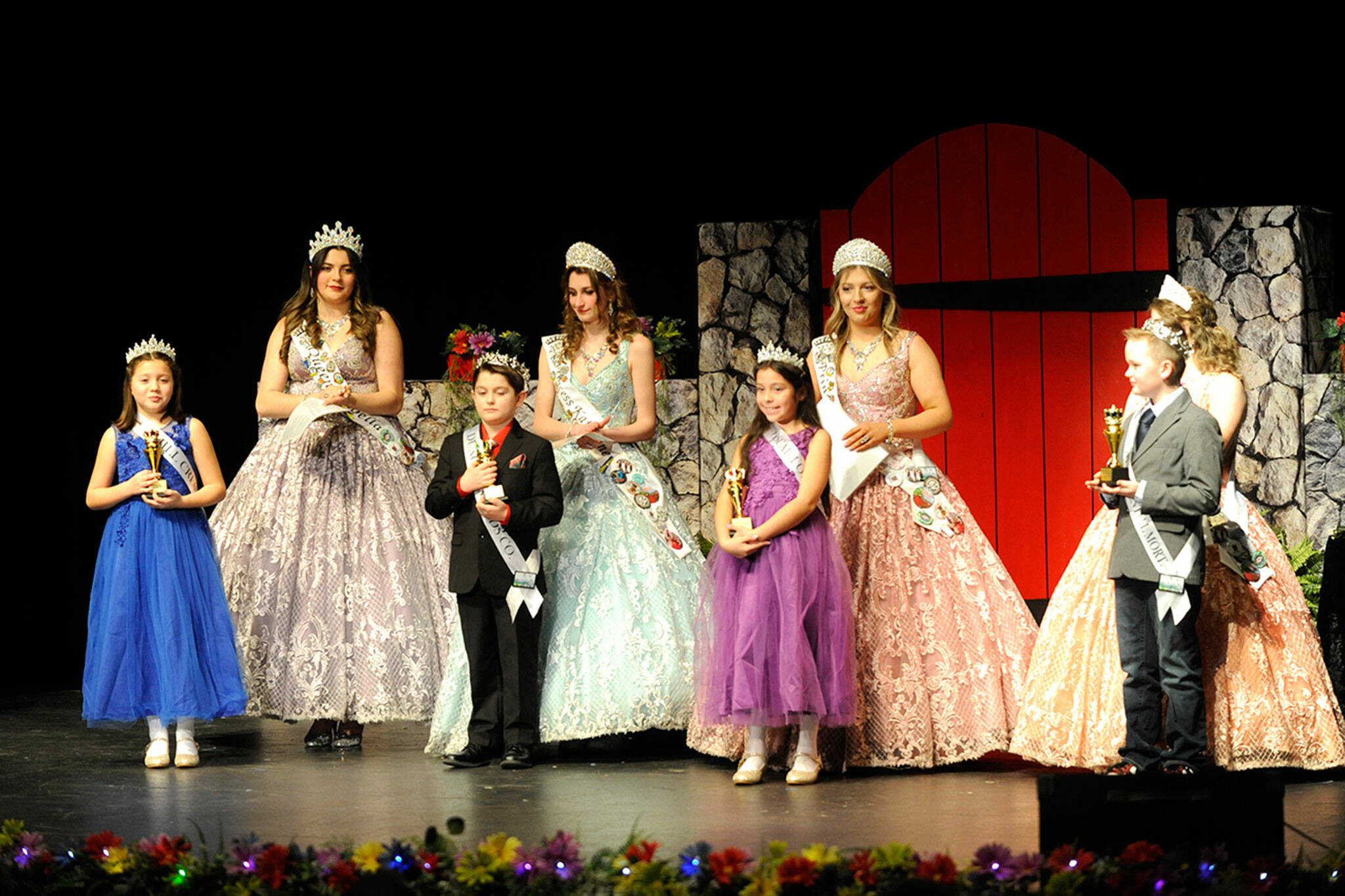 2022 Sequim Irrigation Festival royalty (back row, from left) queen Isabella Williams, princess Katherine Gould, princess Ellie Turner, and princess Lauren Willis, crown the 2023 Junior Royalty. They include, from front left, Sofia Lopez and Greyson Rhodes of Greywolf Elementary, and Lynn Westman and Grayson Castell of Helen Haller Elementary.