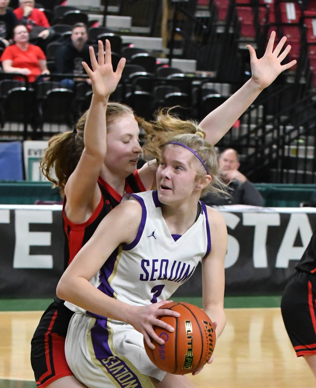 Photo by Jim Heintz / Sequim’s Jolene Vaara looks to score inside in the first half of SHS’s 57-37 win over Sammamish at the class 2A state tournament in Yakima on March 1. Vaara led the Wolves with 16 points.