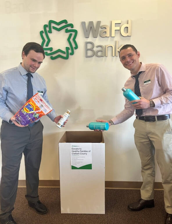 Submitted photo / Sequim Team personal bankers Hunter DeFord, left, and William Mounts of WaFd Bank on Feb. 28 kick off a month-long donation drive this March to benefit Healthy Families of Clallam County.