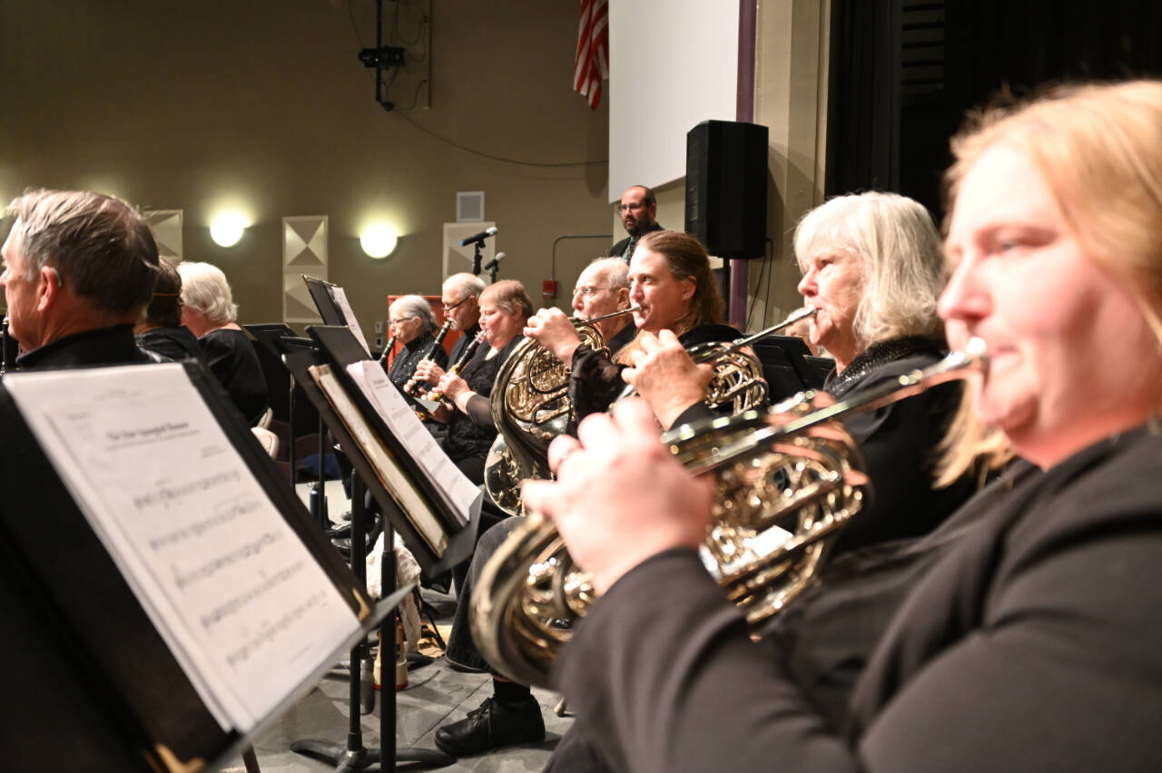 Photo by Richard Greenway/Sequim City Band / Sequim City Band French horn players and clarinetists tunes as music director Tyler Benedict waits to enter at the band’s Oct. 29, 2022 concert.