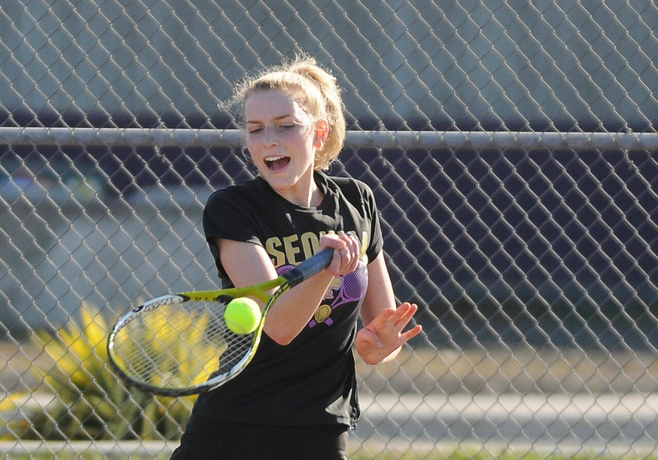 Sequim Gazette file photo by Michael Dashiell
Sequim’s Kendall Hastings hits a forehand in a match against North Mason’s Rachell Youngman in March 2022.