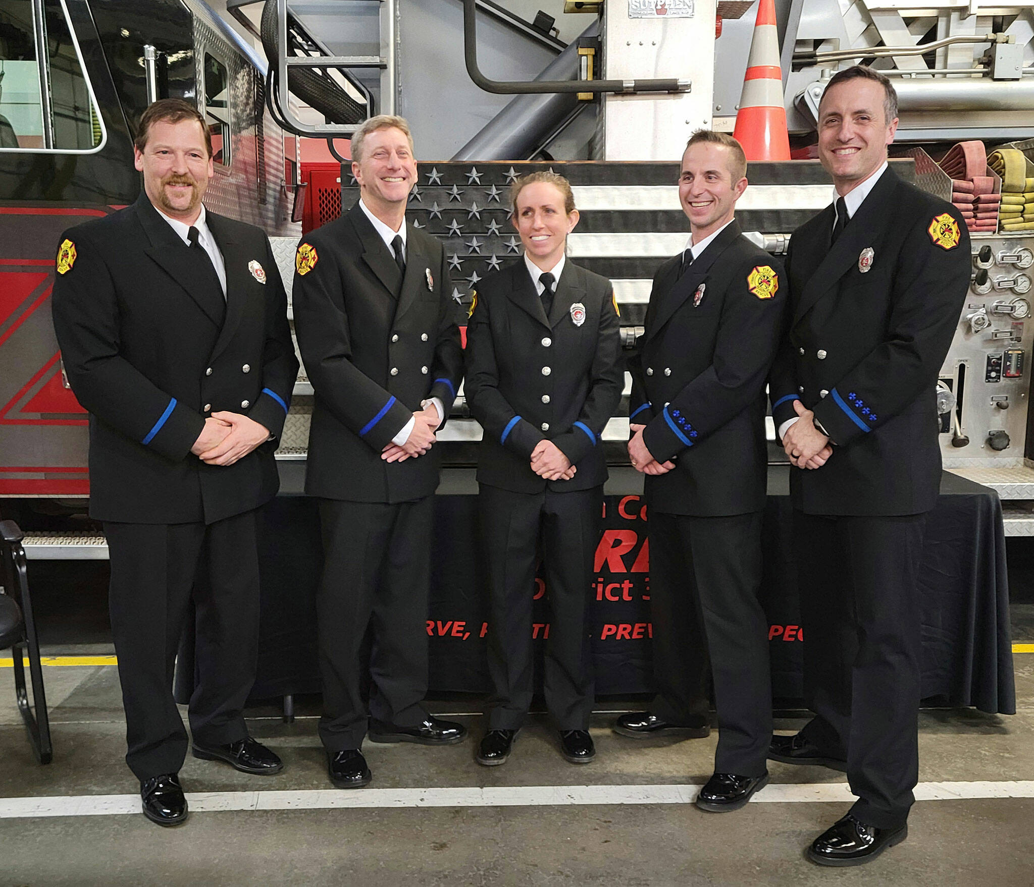 Photo courtesy Clallam County Fire District 3/ Five new Clallam County Fire District 3 firefighters/paramedics were sworn in on March 20, including, from left, Mark Karjalainen, Erik Payne, Eliza Winne, Jeremy Church and Bryant Kroh.