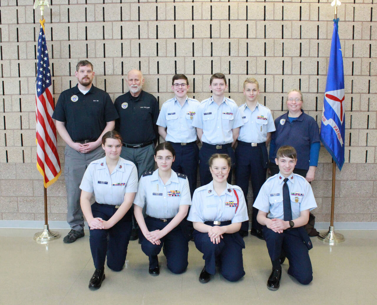 Photo courtesy of Madeline Patterson/Dungeness Composite Squadron / The Dungeness Cadet Competition team and support staff compete at the Washington Wing Cadet Competition in February. Pictured are (back row, from left) Capt. Nick Sue, Lt. Thom Hightower, C/SMSgt Reilly Sue, C/TSgt Trenton Downs, C/SMSgt Joseph Henninger and SM Elizabeth Nickel, with (front row, from left) C/TSgt Hannah Colwill, C/2d Lt. Faith Amaya, C/CMSgt Genna Nickel and C/TSgt Alex Creery.