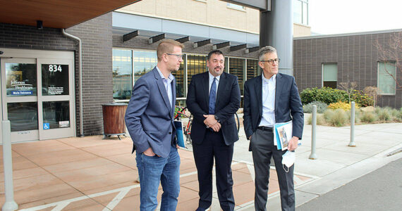U.S. Rep. Derek Kilmer, D-Gig Harbor, left, visited Jefferson Healthcare in Port Townsend on Friday and met with COO Jacob Davidson, center, and CEO Mike Glenn, right. (Tina Herschelman)