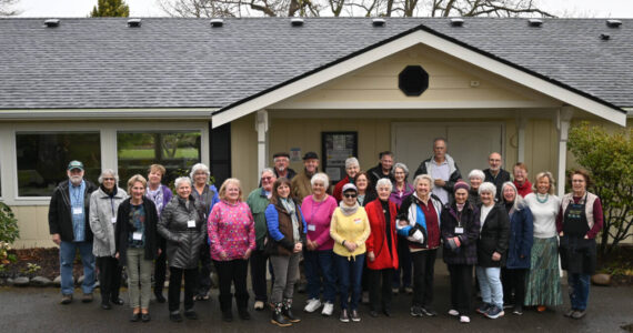 Sequim Gazette photo by Michael Dashiell / Members of the Sequim Prairie Garden Club gather outside the recently renovated clubhouse at Pioneer Memorial Park in early April. The club hosts its major fundraiser, the annual plant sale, from 9 a.m.-1 p.m. on Saturday, May 6, at the park, 387 E. Washington St.