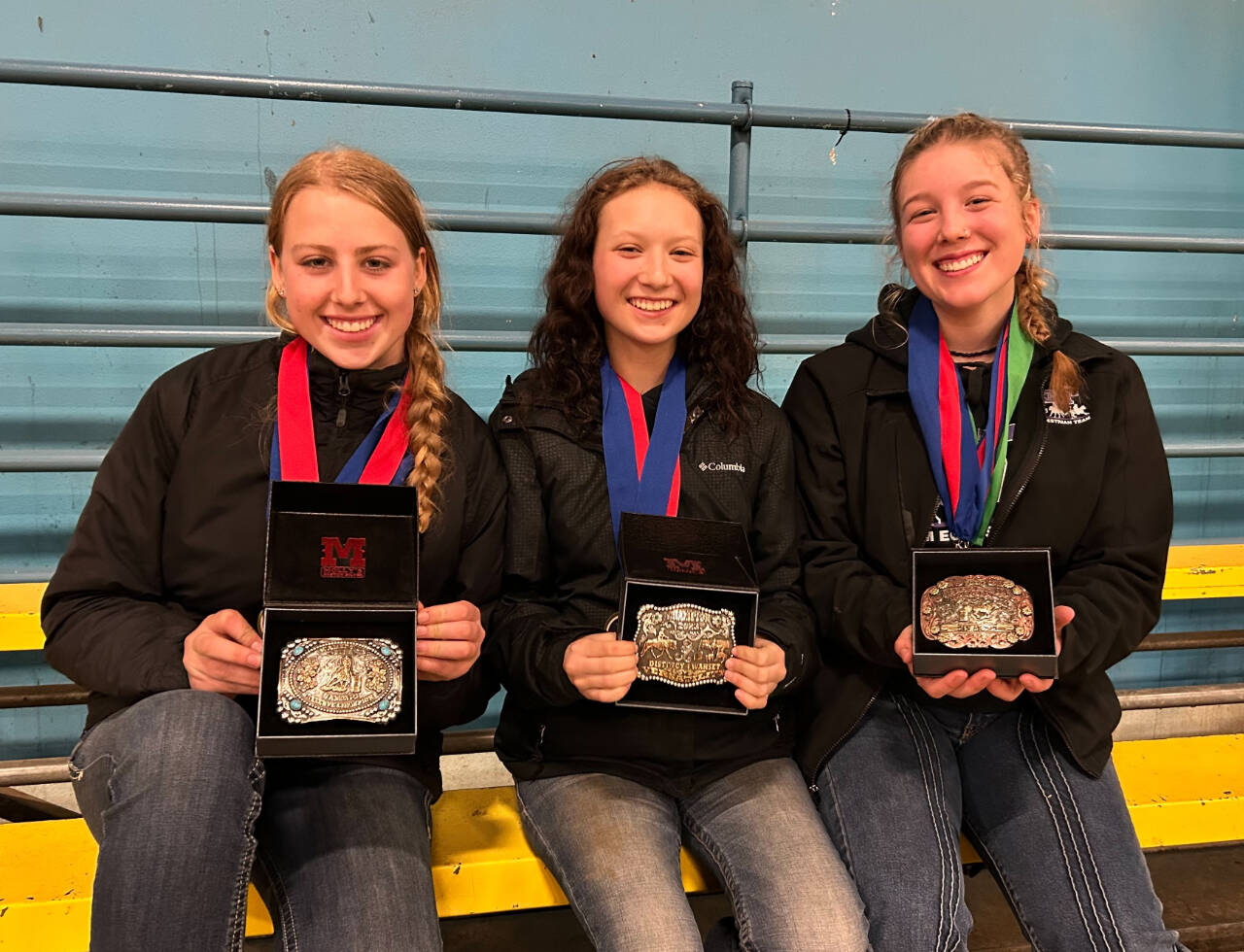 Photo courtesy of Katie Salmon-Newton
Sequim Equestrian Team buckle winners include, from left: Libby Swanberg, timed events reserve champion; Sydney Hutton, versatility events champion; and, Paige Reed, timed events champion. The trio will join teammates at the state meet, set for May 19-21 in Moses Lake.