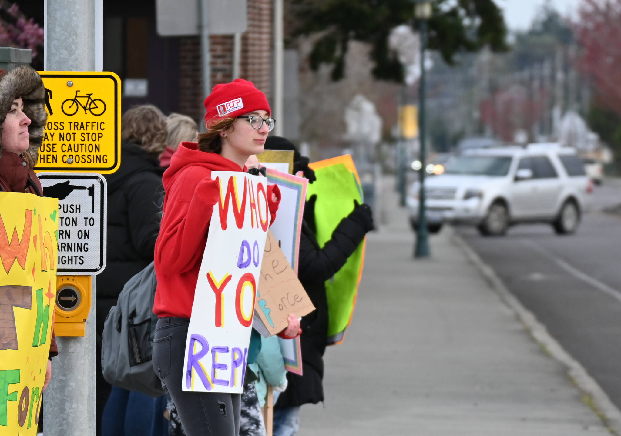 Sequim Gazette photo by Michael Dashiell
Sequim High student Georgia Bullard protests the reconfiguration of Sequim schools at the North Sequim Avenue and Fir Street intersection on April 17. Bullard helped organize Sequim Community Against Realignment and three Monday protests.