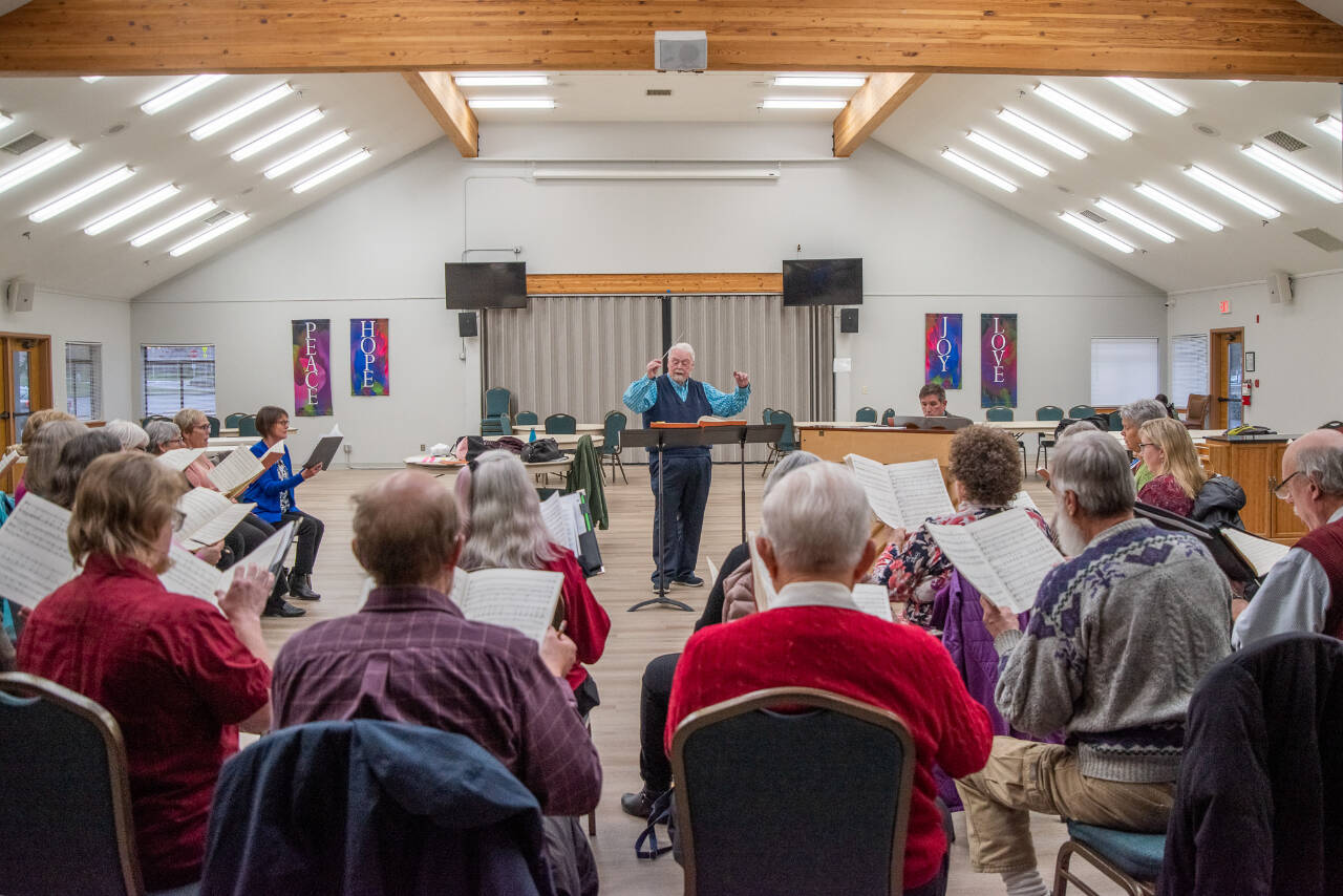 Sequim Gazette photo by Emily Matthiessen / Dr. Jerome Wright leads a Peninsula Singers rehearsal at Trinity United Methodist Church. The group’s spring concerts are April 28 and 29.