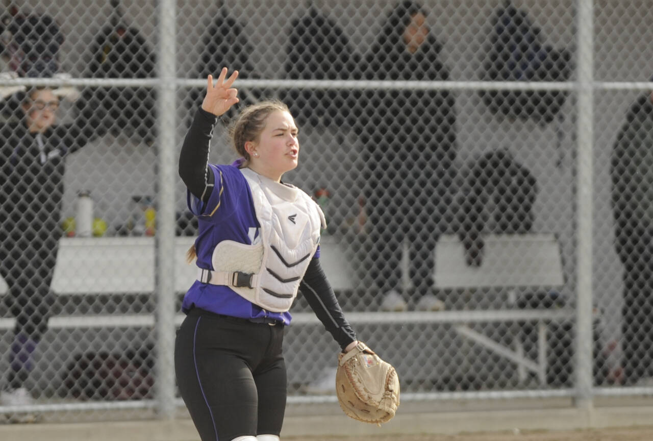 Sequim Gazette photo by Michael Dashiell / Sequim catcher Mikki Green communicates with teammates in between batters in the Wolves’ 7-6 win over Port Angeles on April 18.