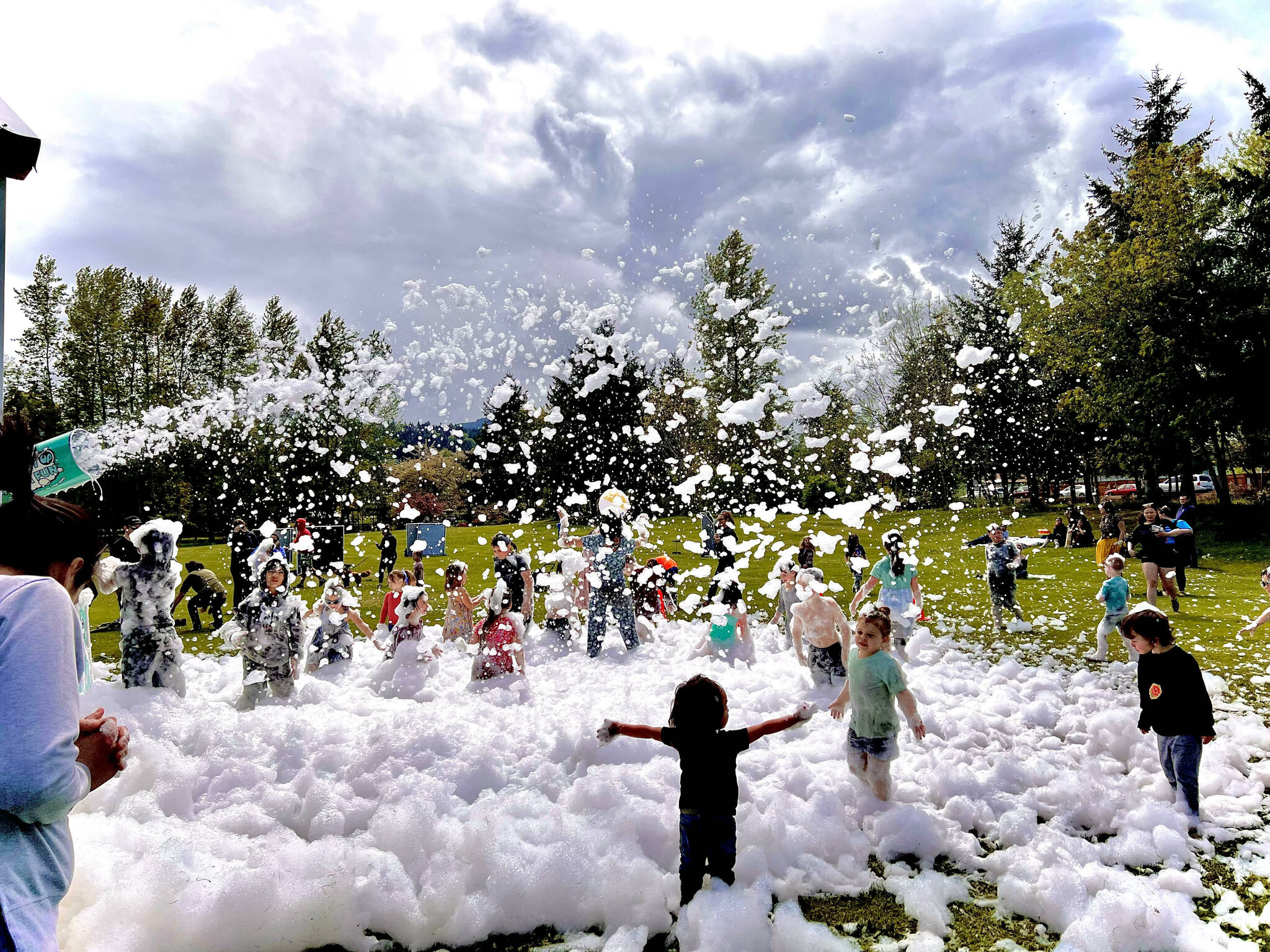 Photo by Stacy Graves
Youngsters enjoy the Strait Up Foam Fun feature at the Family Fun Day at Carrie Blake Community Park on May 7. (See more of Graves’ photos at magiccapturedbystacy.com)