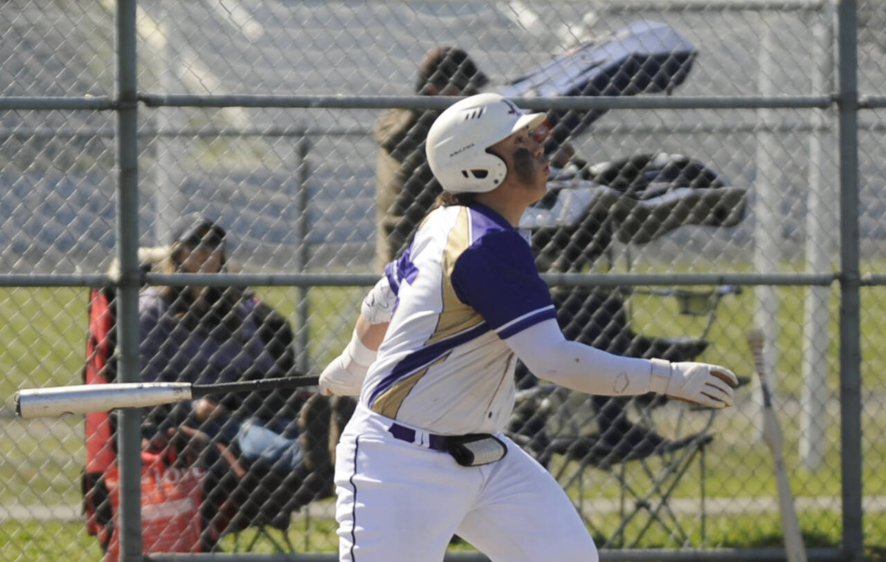Sequim Gazette photo by Michael Dashiell / Sequim’s Ayden Holland watches a popup off his bat in the Wolves’ West Central District tournament match-up with Franklin Pierce on May 9.