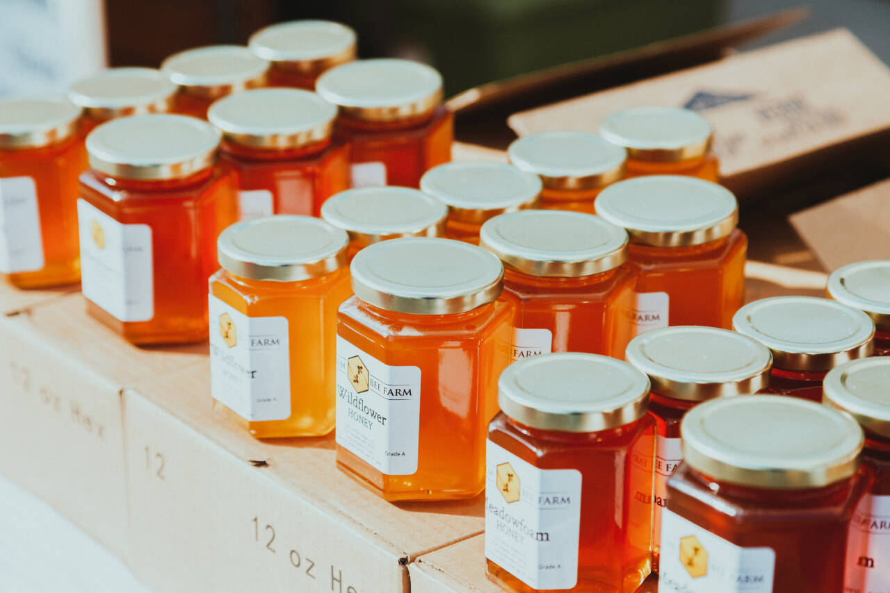 Photo courtesy of Sequim Bee Farm / An eye-catching display at the Market of the honey varieties offered by Sequim Bee Farm.