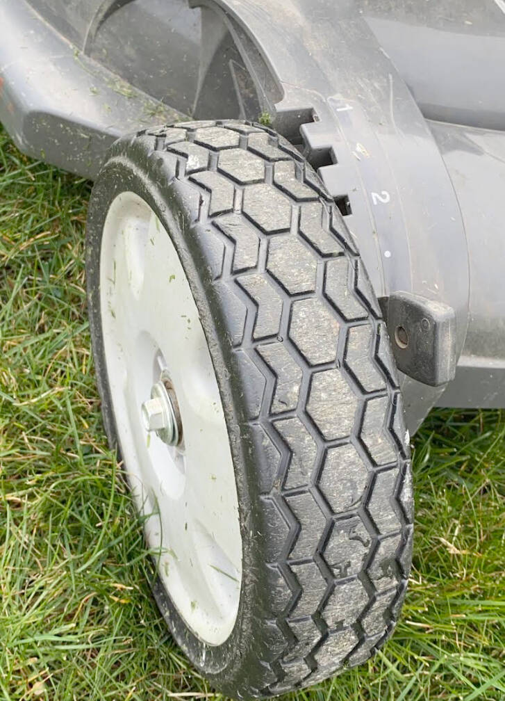 Photo by Dave Eberle / Adjust the wheel settings on your lawn mower to allow for longer, healthier grass.