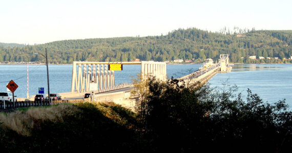 File photo by Brian McLean/Olympic Peninsula News Group / Traffic crosses the Hood Canal Bridge along state Highway 104 in April. State Department of Transportation crews begin permanent repairs to the bridge on Saturday.