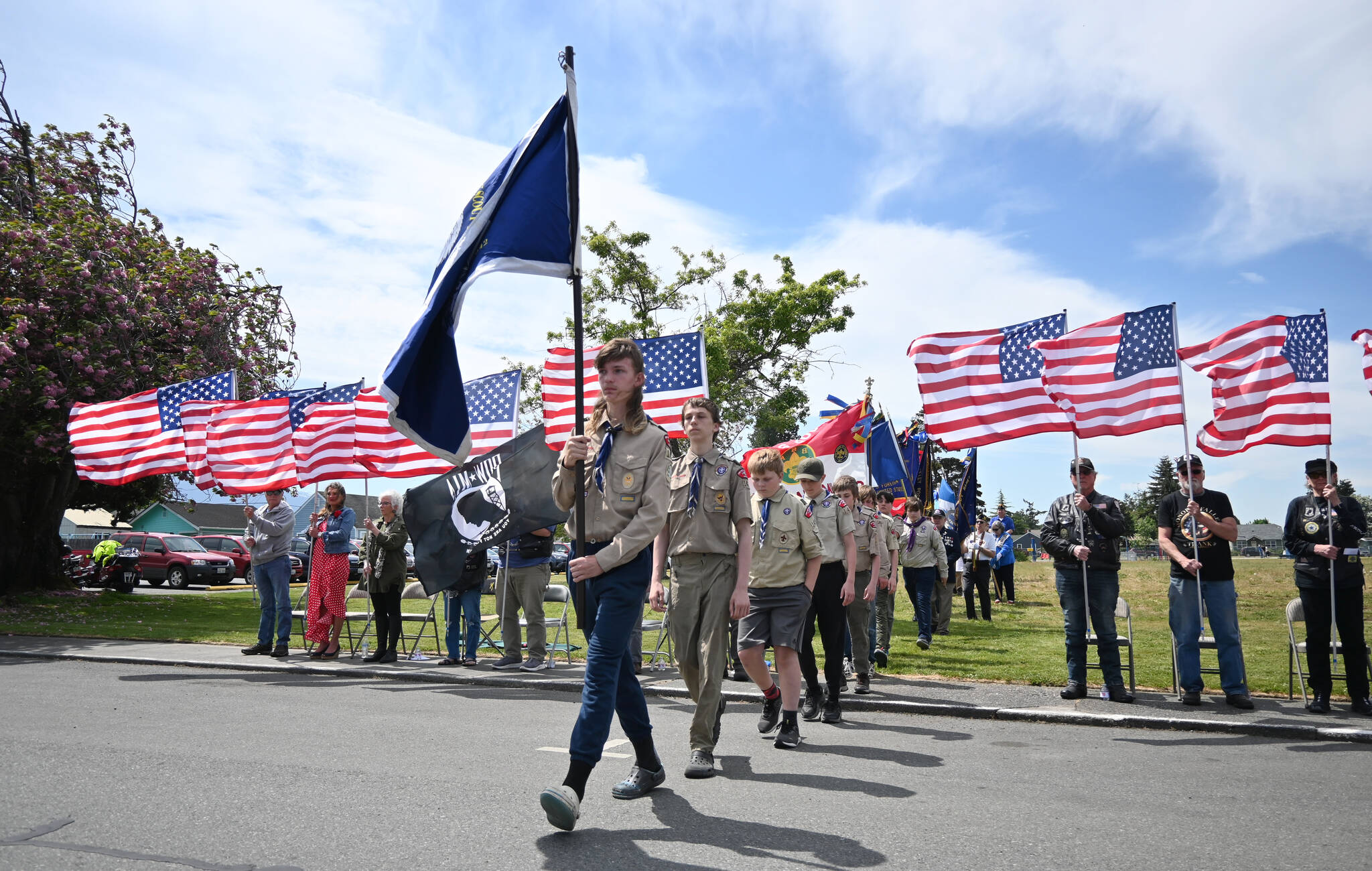 Sequim Gazette photos by Michael Dashiell
Sequim Scout troops help present colors at the Olympic Peninsula Academy flagpole dedication ceremony on May 18.