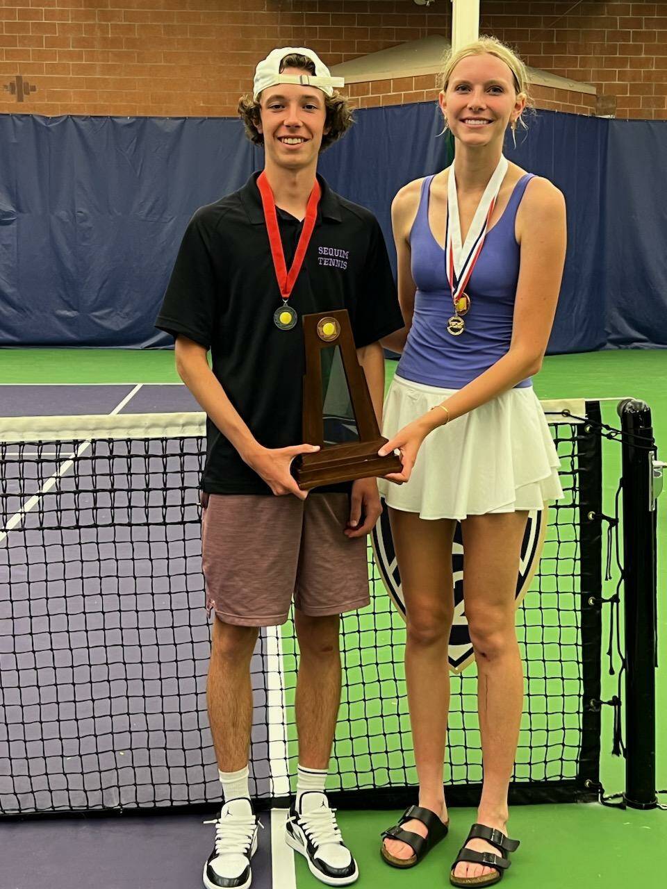 Photo courtesy of Mark Textor / Sequim High’s Garrett Little and Kendall Hastings celebrate strong finishes at the class 2A state tennis tournament in Seattle on May 26. Little took second and Hastings placed third.