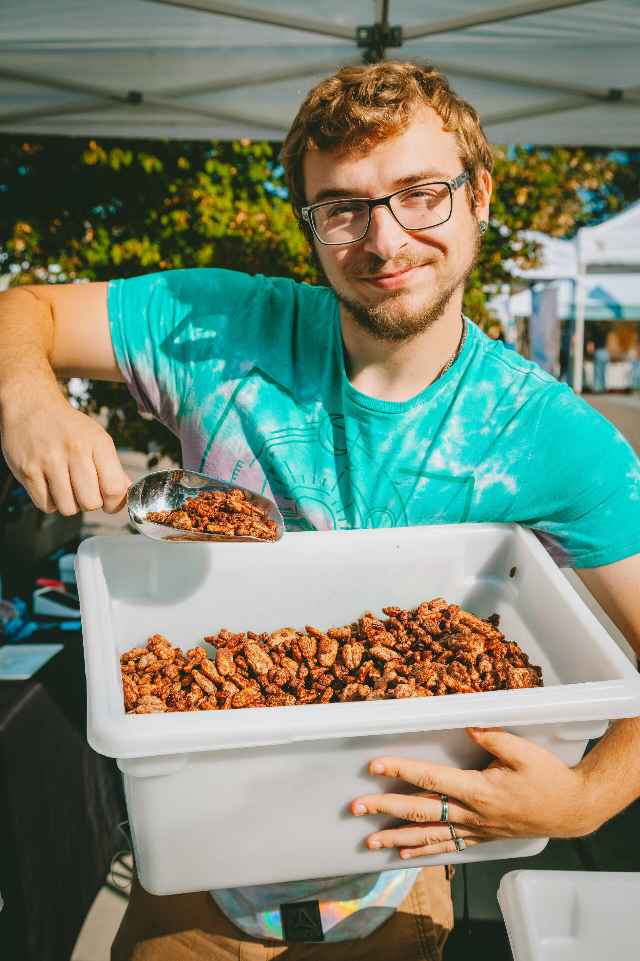 Photo courtesy of Sequim Farmers & Artisans Market/SFAM /Josiah Shearing of D’s Nuts is a regular vendor at the market, providing hot, yummy goodness for market-goers and packaging nuts for those on food assistance to take home.