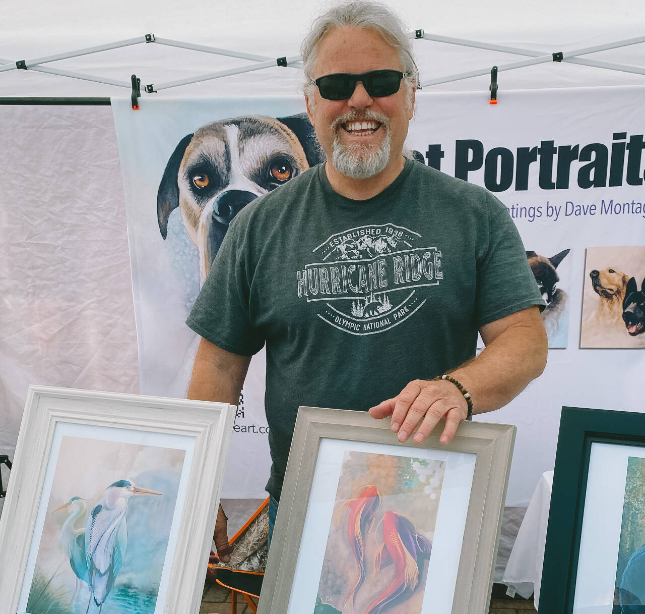 Photo by Bailey Loveless/Sequim Farmers & Artisans Market (SFAM)
Dave Montague displays some artwork at his Sequim Farmers & Artisans Market booth.