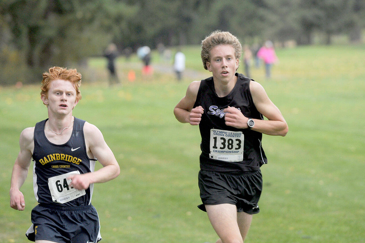 Sequim Gazette file photo by Michael Dashiell / Sequim’s Colby Ellefson, competes at the Olympic League Cross Country Championships at The Cedars at Dungeness golf course in 2021.