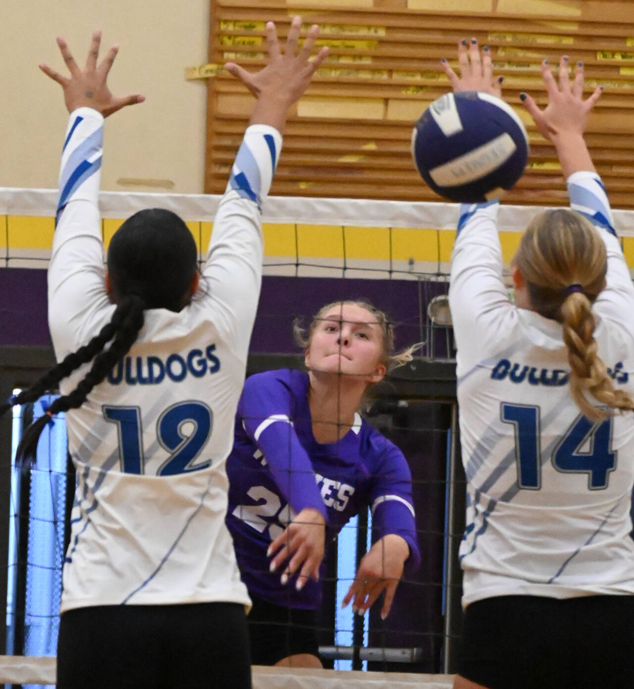 Sequim Gazette photos by Michael Dashiell
Sequim’s Jolene Vaara, center, tips a shot past North Mason defenders in the Wolves’ four-game season-opening win at home on Sept. 12.