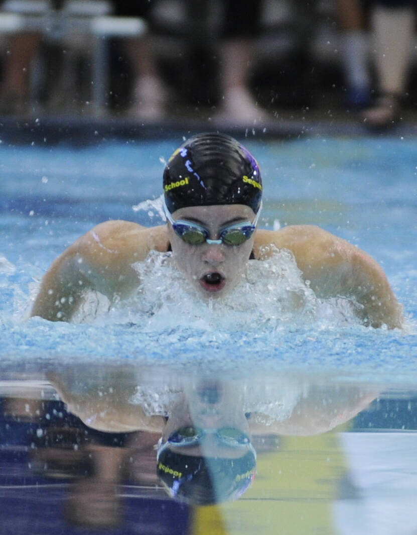 Sequim Gazette photos by Michael Dashiell
Sequim freshman Ava Shinkle swims to a win in the 100 butterfly in the Wolves’ season-opening win over visiting East Jefferson on Sept. 13.