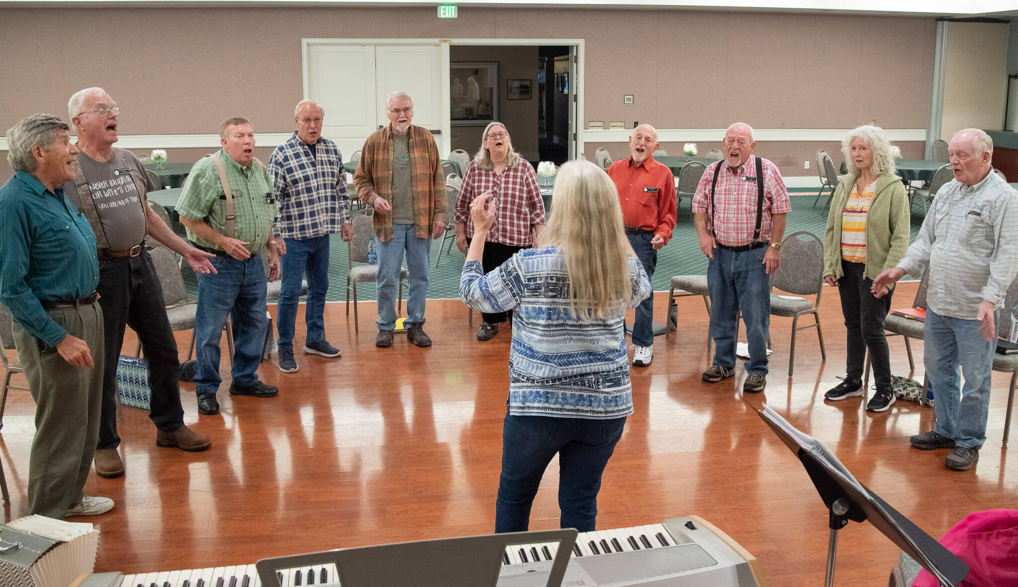 Sequim Gazette photo by Emily Matthiessen 
Members of the Juan de Fuca Harmony, a chapter of Barbershop Harmony Society, prepare last week for their 40th anniversary show, slated for 2p.m. on Saturday, Sept. 16, at Trinity United Methodist Church.