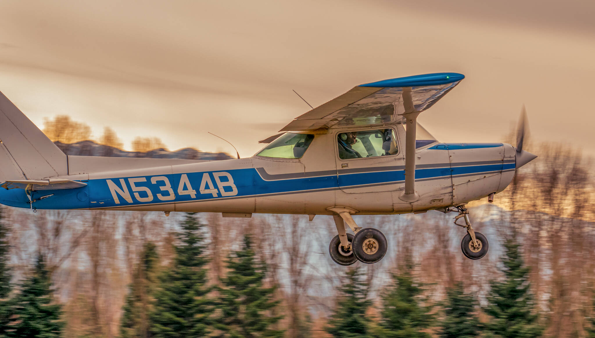 Photo by Jesse Nichol / Anatolian Eagle Flight Academy instructor Cenk Özer flies with student Connor Bear in a 1980 Cessna 152 trainer airplane.