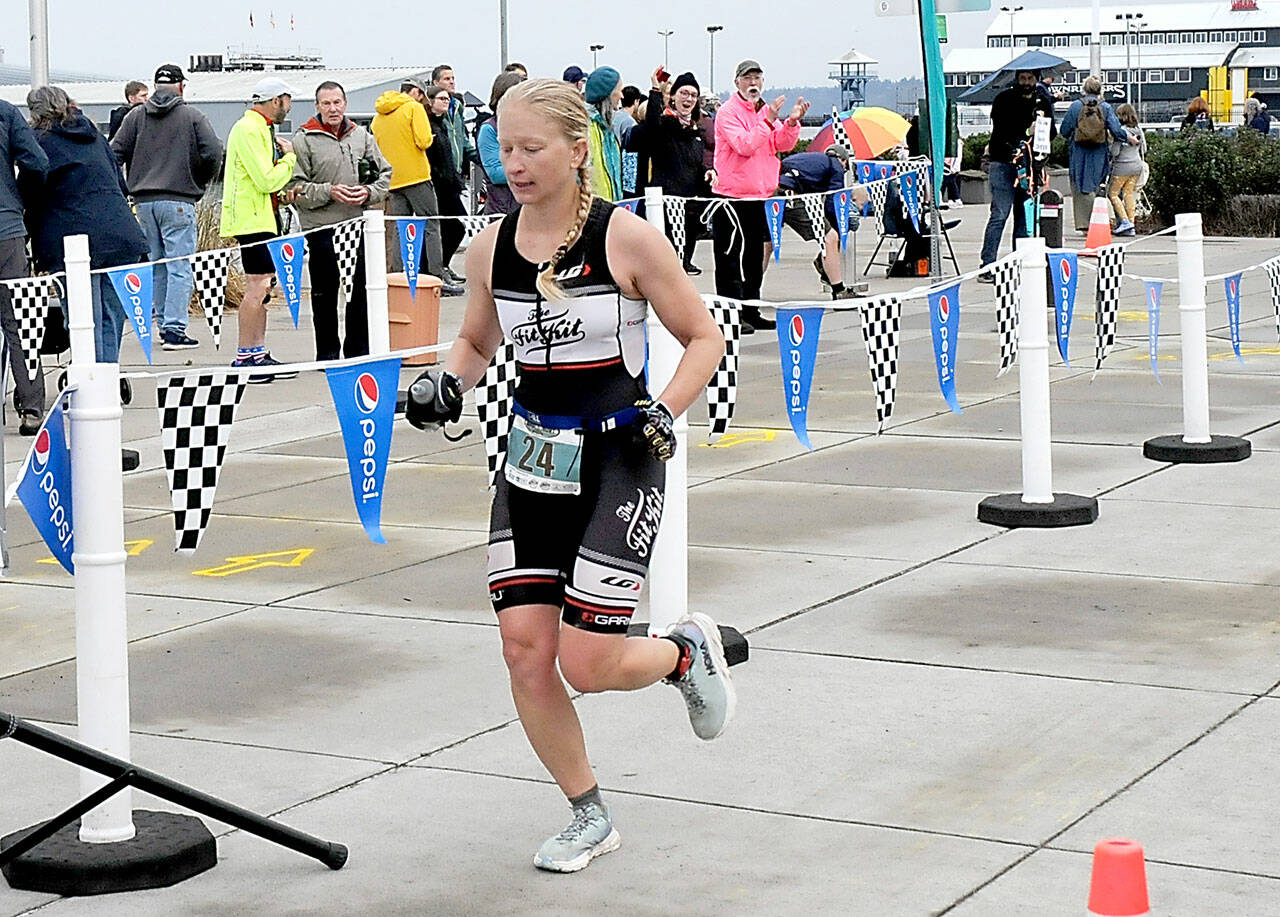 Photo by Keith Thorpe/Olympic Peninsula News Group / Jennifer Higgins of Bozeman, Mont., crosses the line as top womans racer in the ironman category of the 2023 Big Hurt in Port Angele on Sept. 23.