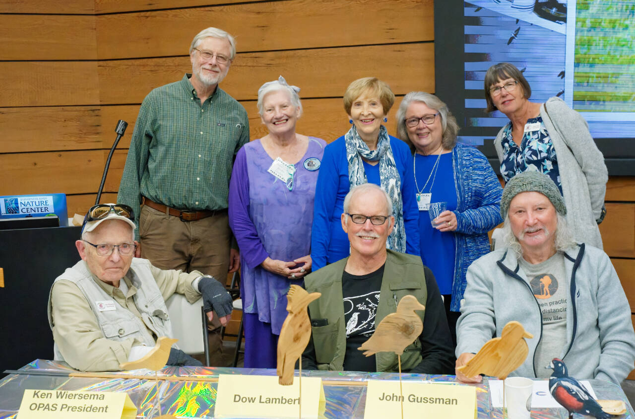 Photo courtesy of Olympic Peninsula Audubon Society
Olympic Peninsula Audubon Society members celebrate the organization’s 50th anniversary. Pictured are (back row, from left) Bob Boekelheide, Kendra Donelson, Audrey Gift, Sue Dryden and Marie Grad, with (front row, from left) OPAS president Ken Wiersema, OPAS President; Dow Lambert and John Gussman.