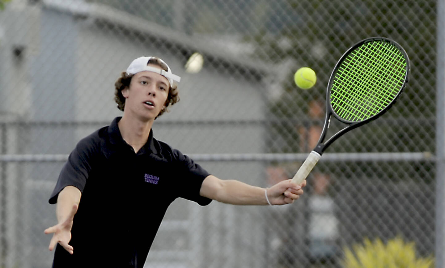 Sequim Gazette photo by Michael Dashiell / Garrett Little competes against Port Angeles on Oct. 11. Little went 4-0 at the Olympic League boys tennis championship to win the league title.