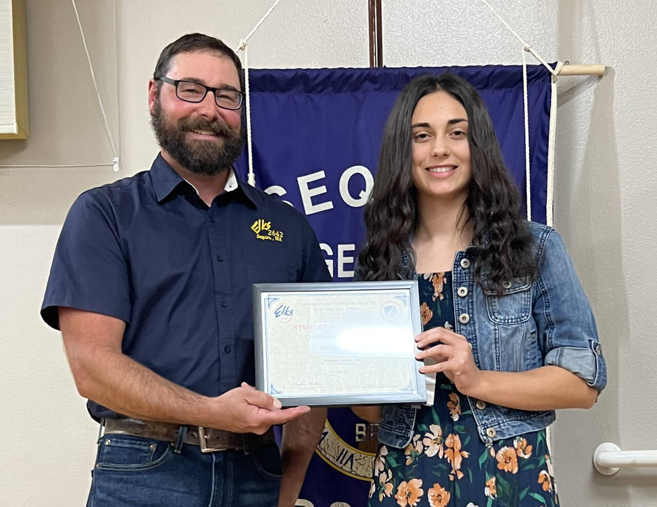 Photo courtesy of Sequim Elks
Olivia Baros accepts her Sequim Elks Student of the month for October honor from Exalted Ruler Klayton Waldron.