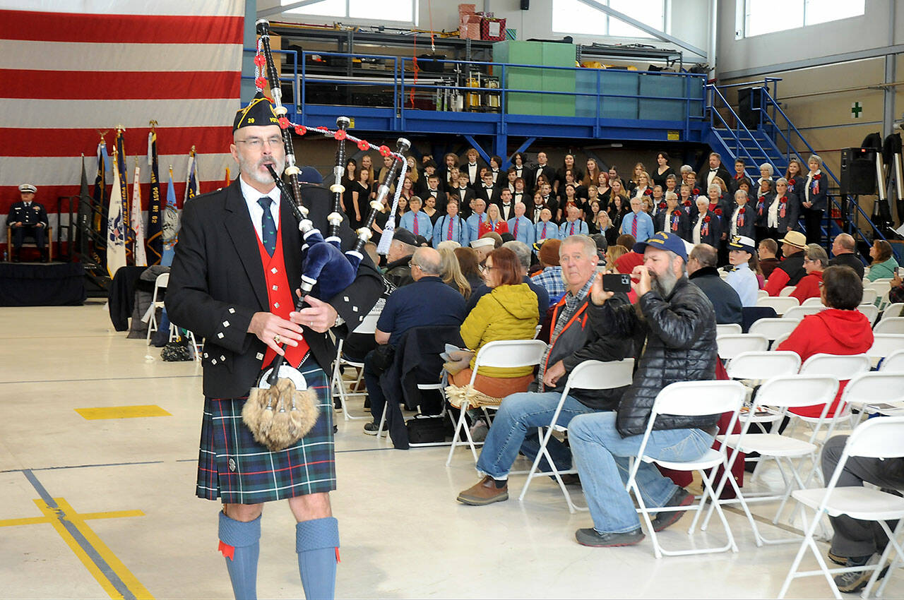Photo by Keith Thorpe/Olympic Peninsula News Group
Bagpiper Rick McKenzie performs “Amazing Grace” to close the Veterans Day ceremony in the hanger at U.S. Coast Guard Air Station/Sector Field Office Port Angeles on Nov. 11.