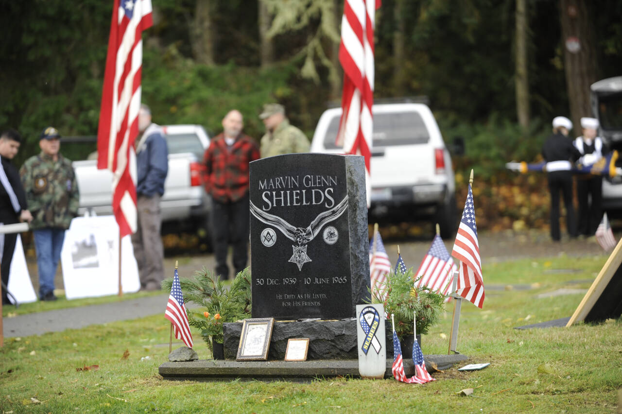 Sequim Gazette photo by Michael Dashiell / The community honors Medal of Honor recipient construction mechanic third class Marvin G. Shields, at Gardiner Community Cemetery on Nov. 11. Shields is the only Navy Seabee to have received the Medal of Honor. He was posthumously awarded the Medal of Honor for heroism above and beyond the call of duty in the Vietnam War. A native of Gardiner, Shields was buried with a Marine Corps honor guard at the Gardiner Cemetery on June 19, 1965.