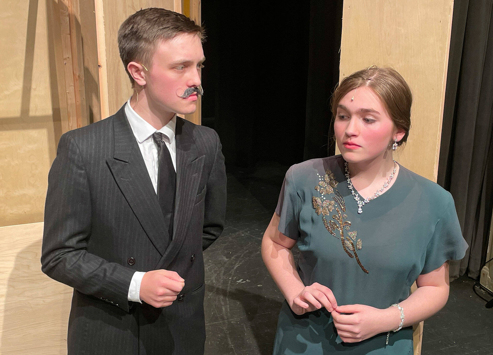 Hercule Poirot (Evan Anderson) interrogates Countess Andrenyi (Emma Gilliam) rehearse a scene of “Murder on the Orient Express.”