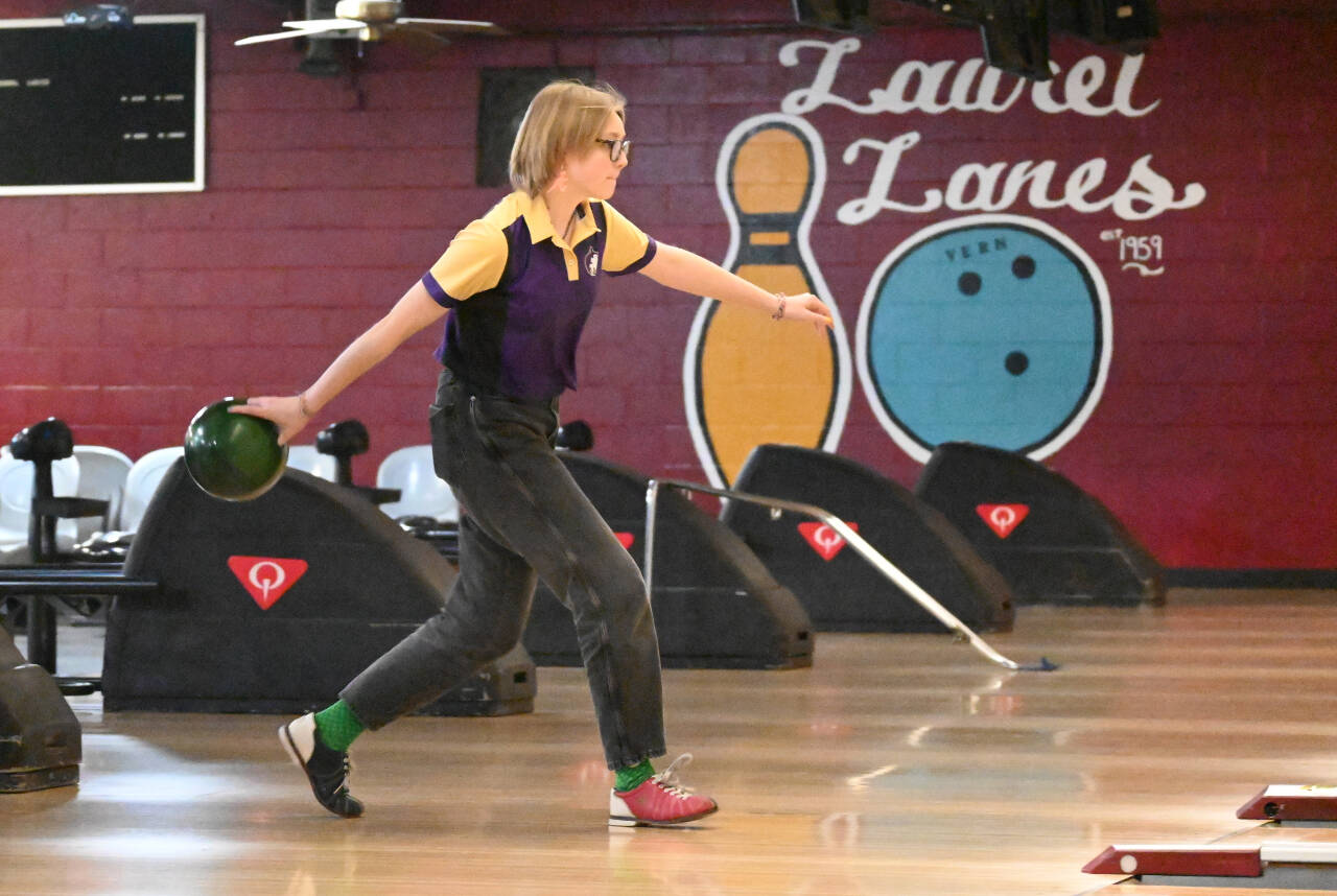 Sequim Gazette photo by Michael Dashiell / Sequim's Kimberly Heintz looks for a strike as the Wolves take on Klahowya at Laurel Lanes in Port Angeles on Nov. 16. Heintz paced Sequim with a 266-pin series, including 149 pins in the second game.